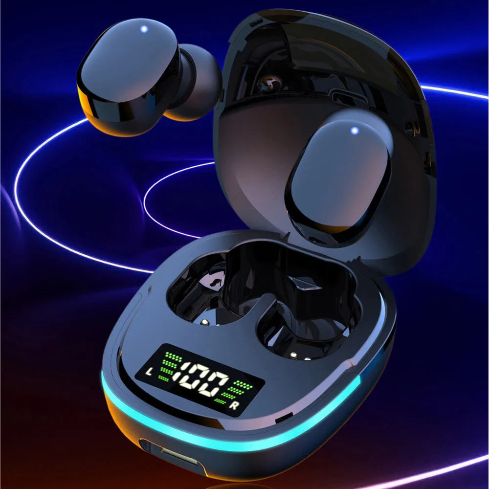 Black true wireless Bluetooth in-ear headphones placed inside their magnetic charging case.