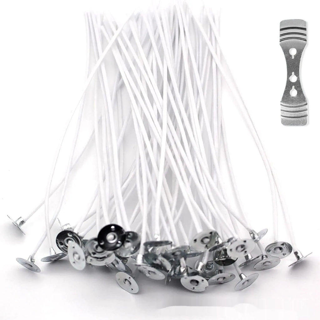 White cotton candle wicks for DIY candle making in three length options on craft background