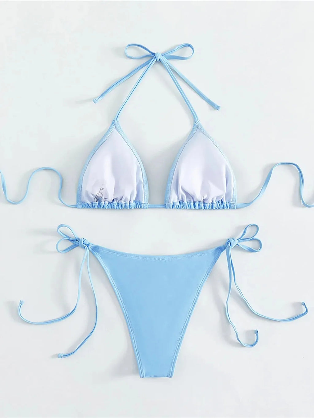 Women's light blue nylon bikini with rhinestone crystal ornaments, brief style, sleeveless, size S M L