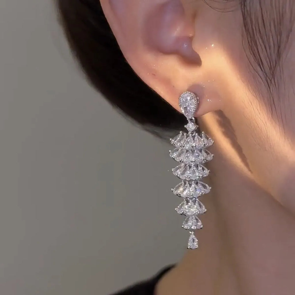 Women's silver pagoda colour Christmas tree drop earrings with pagoda shape on copper studs.