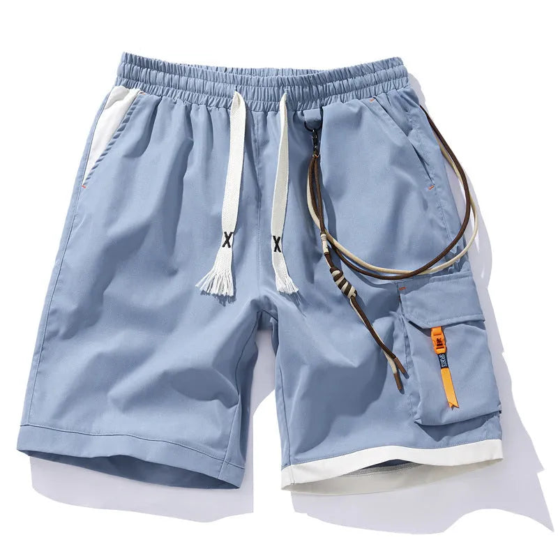 Man wearing coffee-coloured high-waisted bamboo fibre plus-size sports shorts with a loose, straight-leg fit.