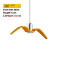 Nordic modern macaron-shaped LED chandelier light fitting in multiple colour options.