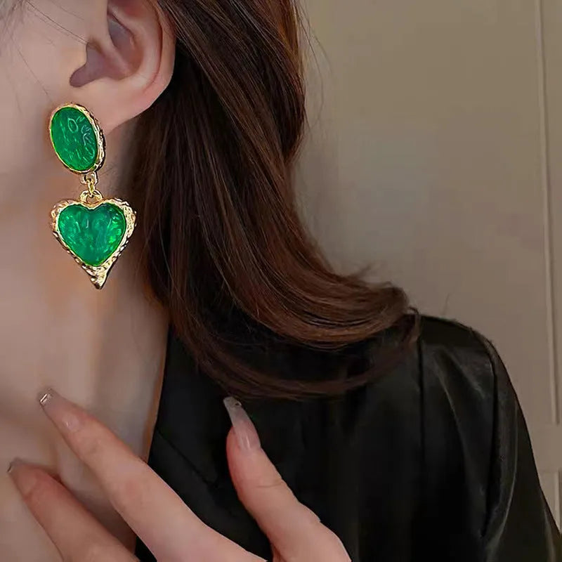 Silver needle pleated oval love heart stud earrings in green, purple, red, and yellow white on alloy posts.