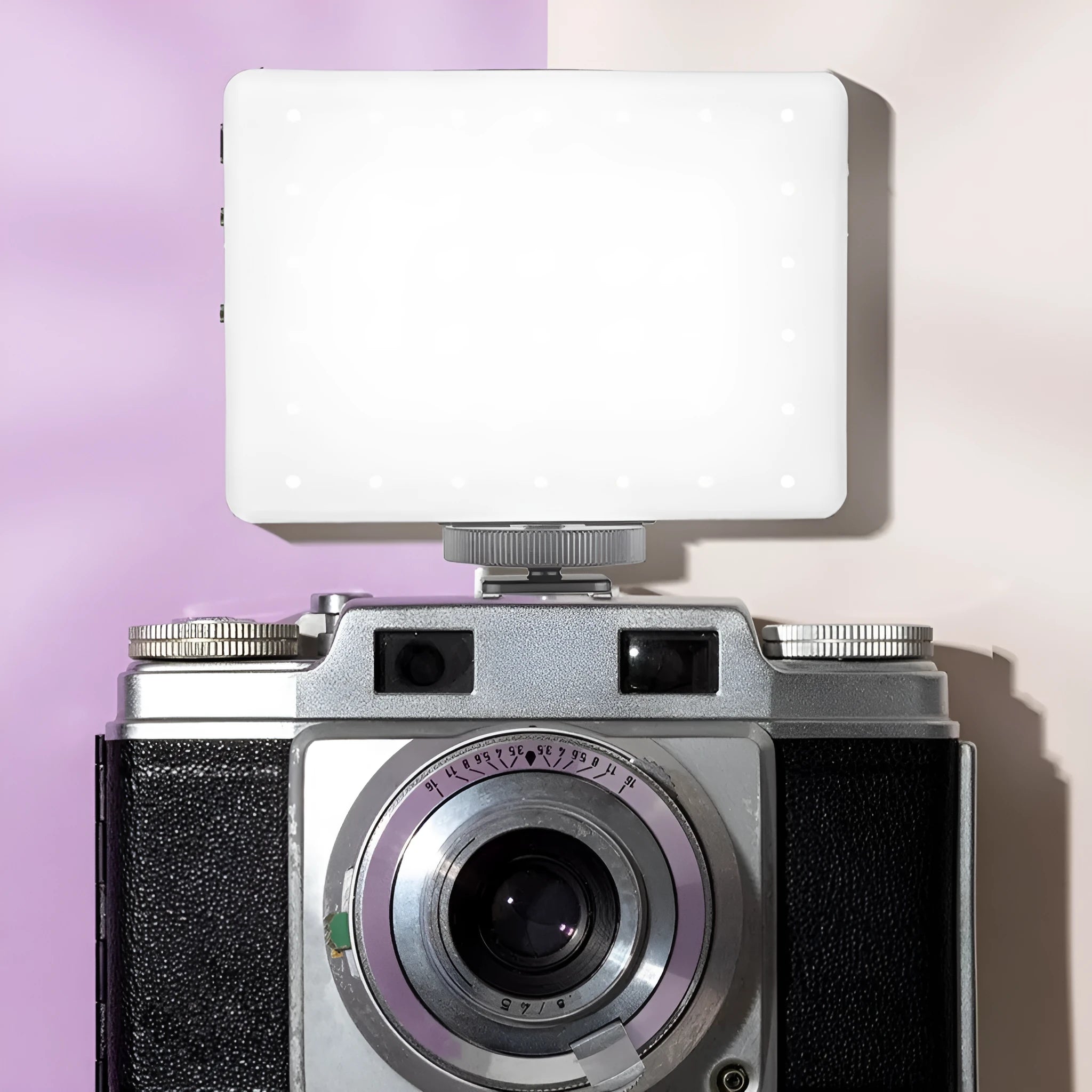 Portable LED fill light with clip attached to mobile phone for photography
