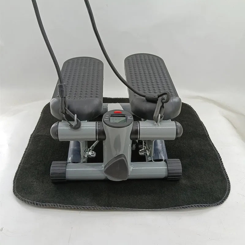 Silver grey household mini treadmill with hydraulic resistance system for waist slimming.