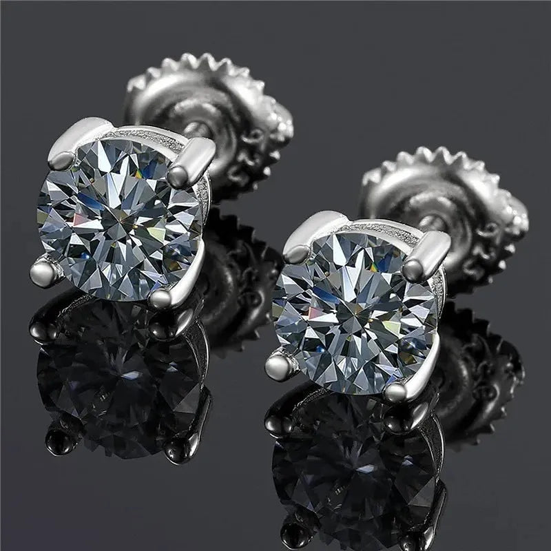 Silver geometric four claw stud earrings with moissanite stone and screw back fitting.