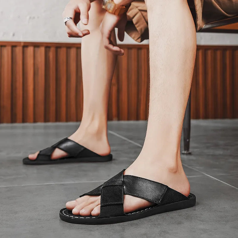 Men's black casual slip-on sandals with a genuine pigskin leather upper and rubber sole
