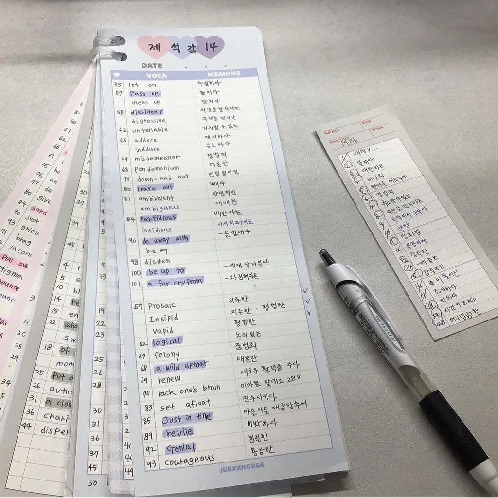 Blue B5 half-size vertical notepad with 30 sheets next to pink and purple versions.