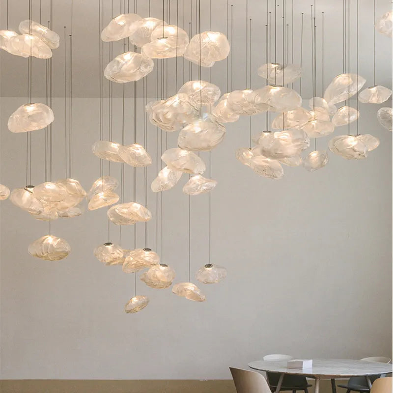 Modern fabric chandelier with glass shade in amber, clear, or smoke grey colour, shown in large and small size options.