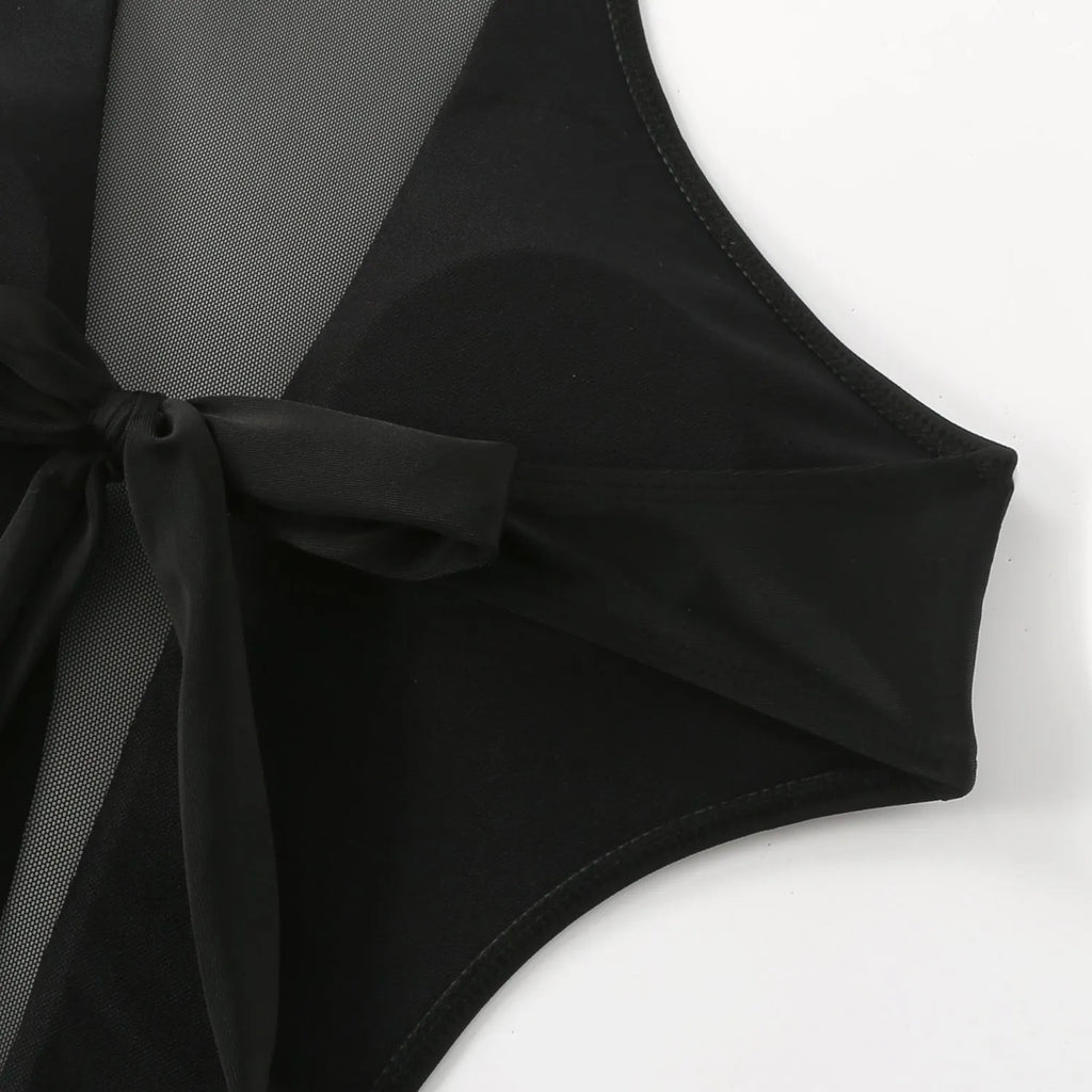 Black one-piece women's swimsuit with hollow out strap detail on the back.