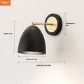 Black iron Nordic-style wall lamp mounted beside a bed with four different shade design options.