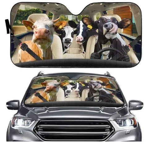 Telescopic aluminium foil car sun shield extended across a vehicle windscreen