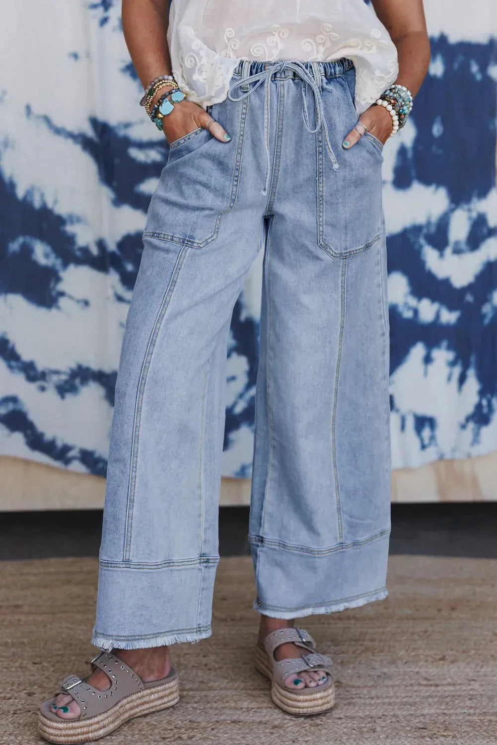 Beau Blue women's wide leg denim trousers with drawstring waist and raw hem detailing