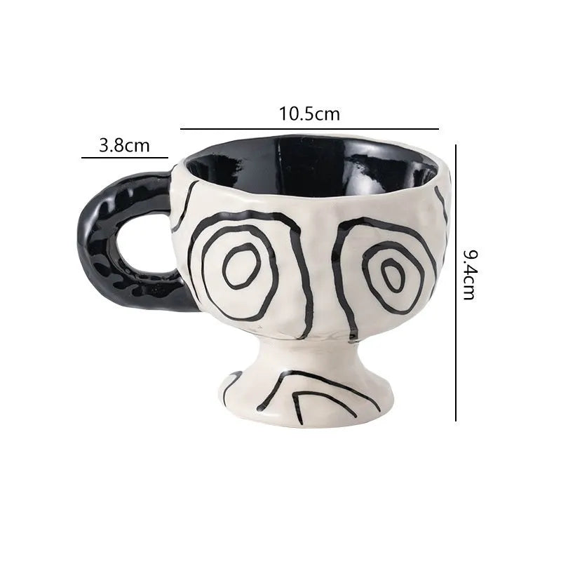 Hand-pinched irregular ceramic mug in solid colour with modern design and 14.5cm height