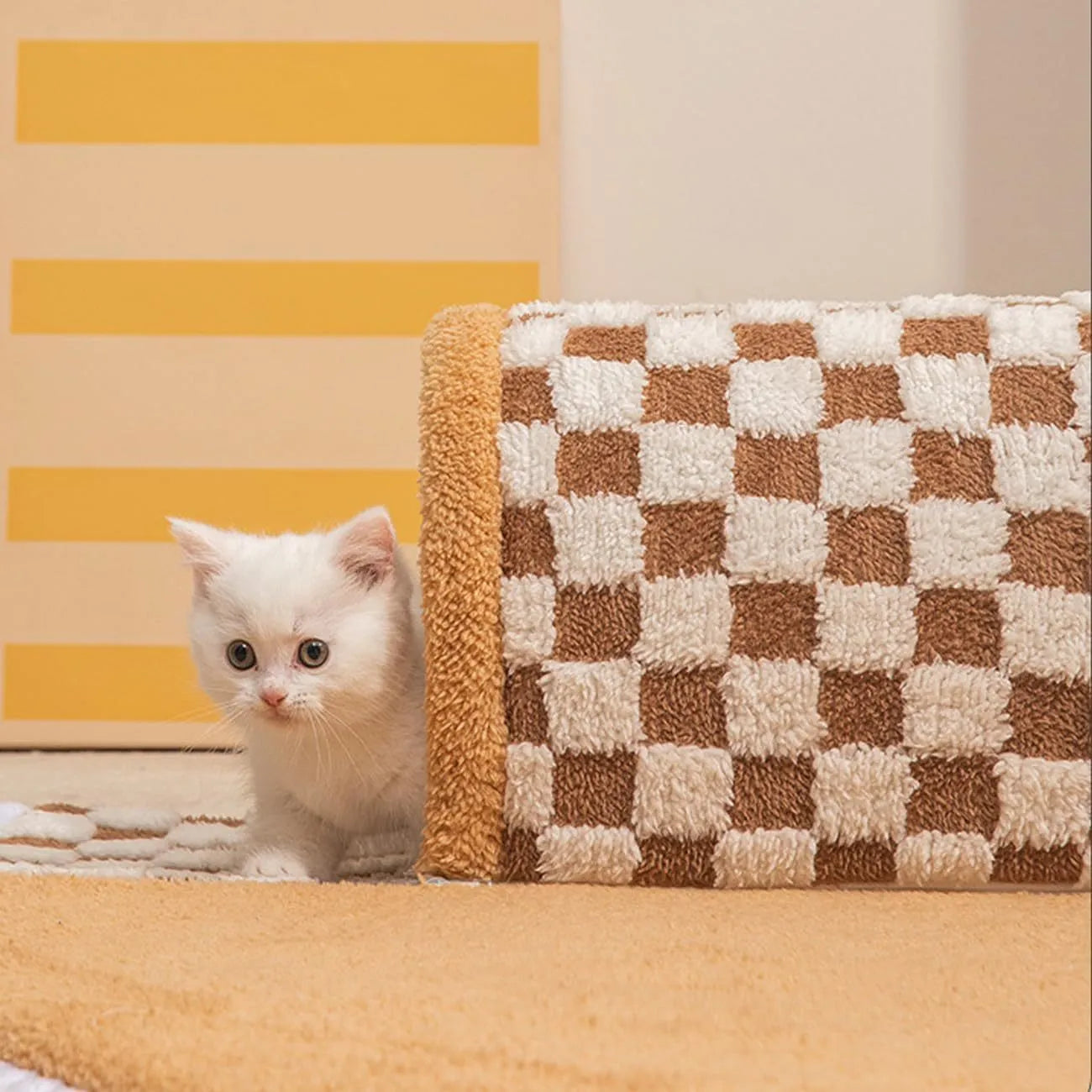 Coffee coloured plush fan-shaped pet bed with attached tunnel, showing anti-slip base.