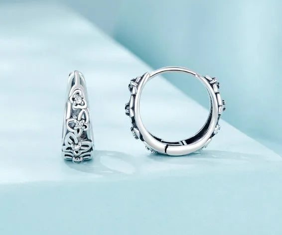 Sterling silver retro butterfly earrings with hollow design and zircon stones