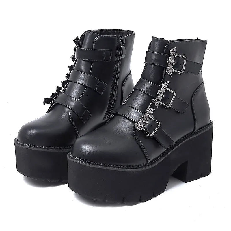 Black women's punk style Martin boots with a side zipper and thick heel.