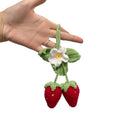 Handmade strawberry-shaped car pendant woven from cotton and hemp, a hanging decorative ornament.