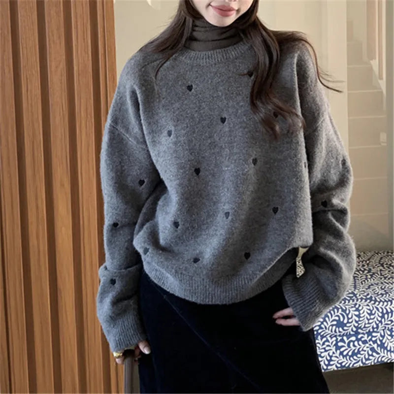 Women's loose fit acrylic pullover sweater with embroidery detail in milky white, grey, or pink.