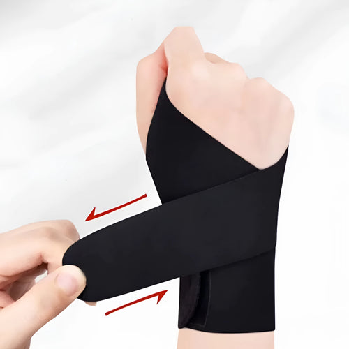 Black adjustable athletic wristguard shown on a wrist, suitable for badminton, tennis, and volleyball.