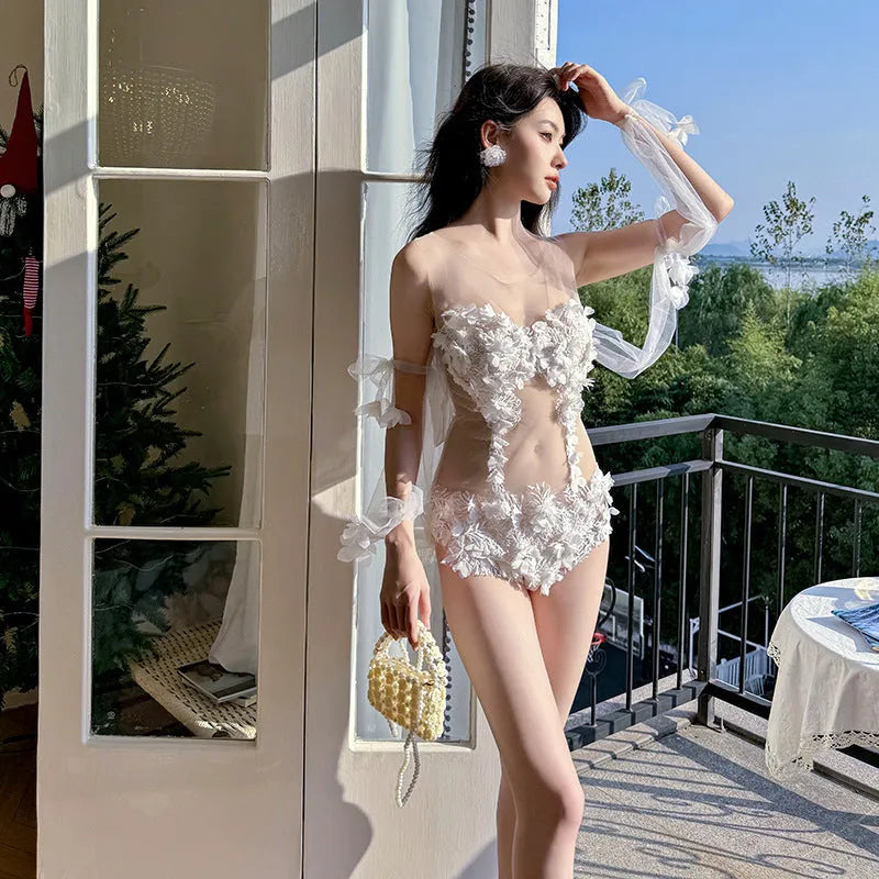 White one-piece swimsuit with see-through lace embroidered triangle backless design, nylon and spandex, sizes M L XL