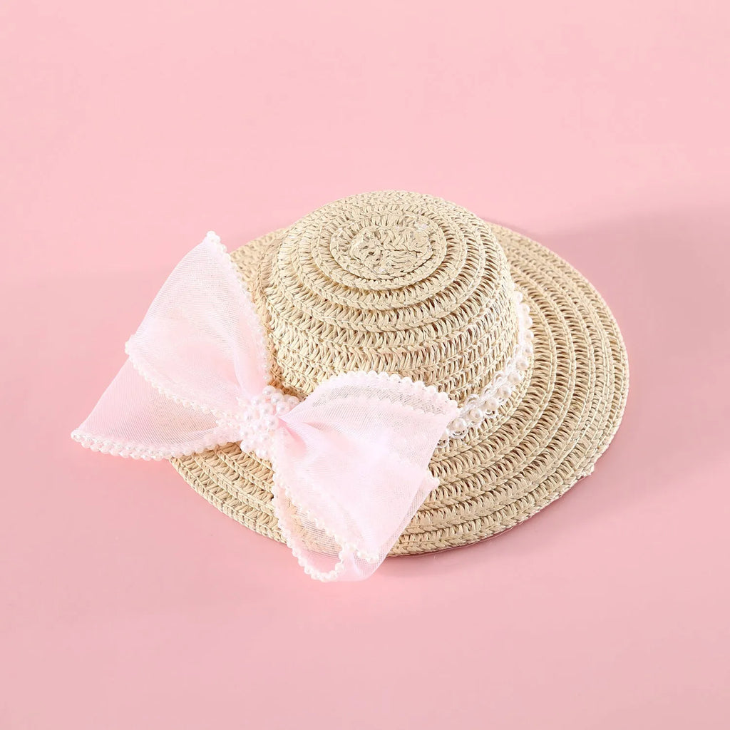 Woven straw pet hat with pearl bow decoration in pink, purple, blue or white colour options