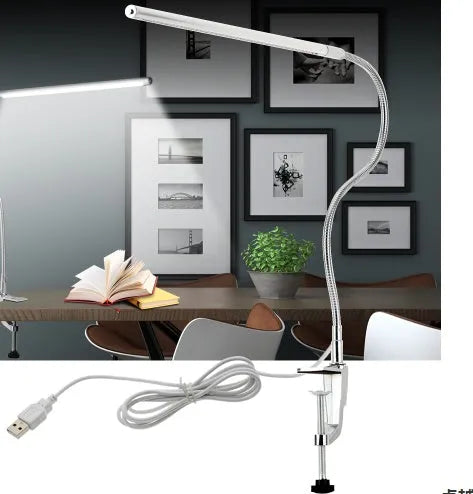 Silver aluminium USB-powered clip-on LED table lamp with a long arm extended, for nail art and detailed tasks.