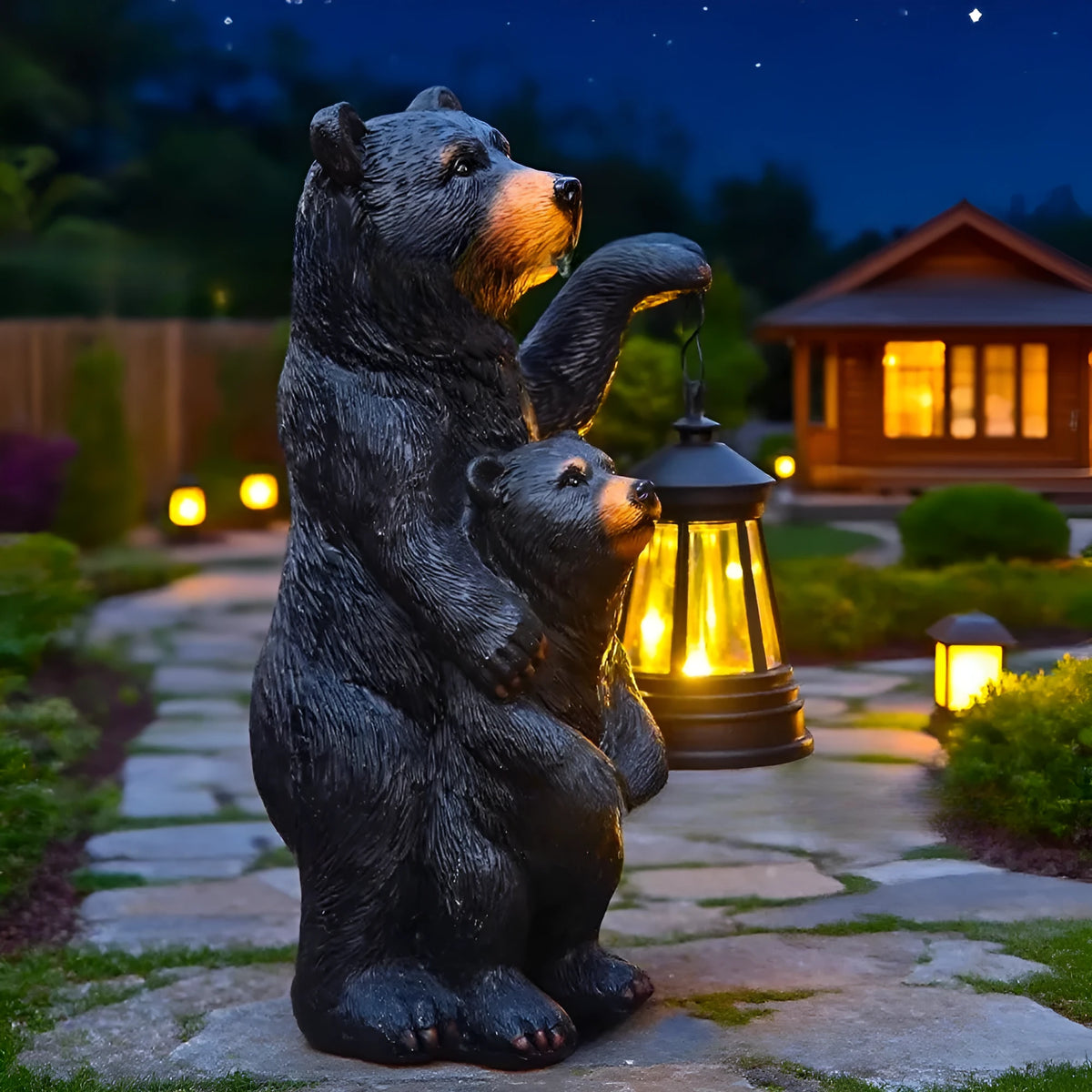 Resin black bear mother and child lantern ornament on a wooden shelf