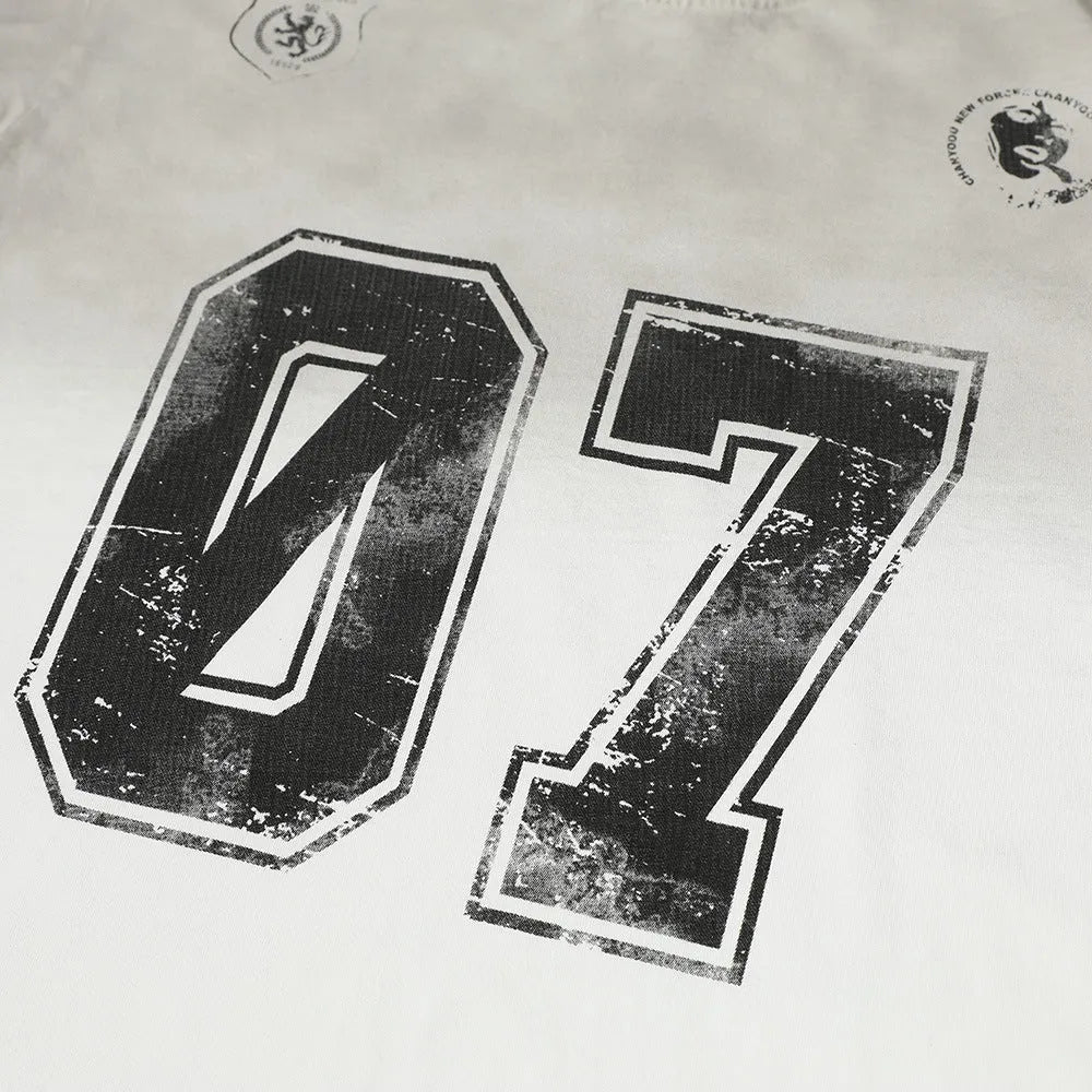 Men's printed short-sleeved cotton T-shirt shown in black and white colour options