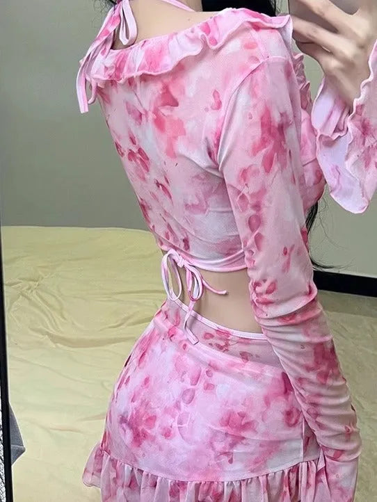 Women's cherry blossom pink floral print bikini set on a mannequin
