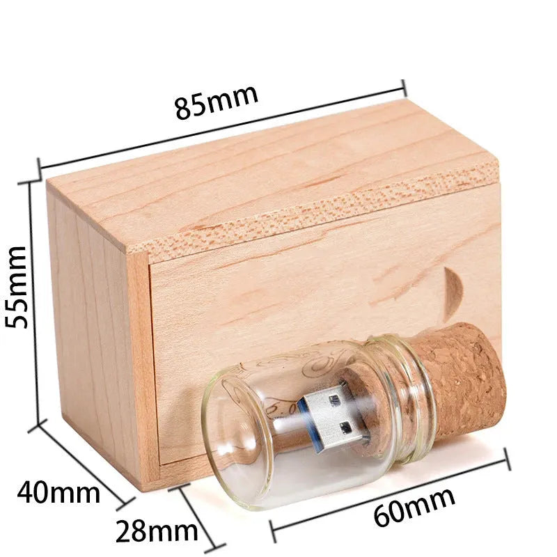 Chocolate brown wooden drift bottle shaped USB flash drive on a wooden surface.