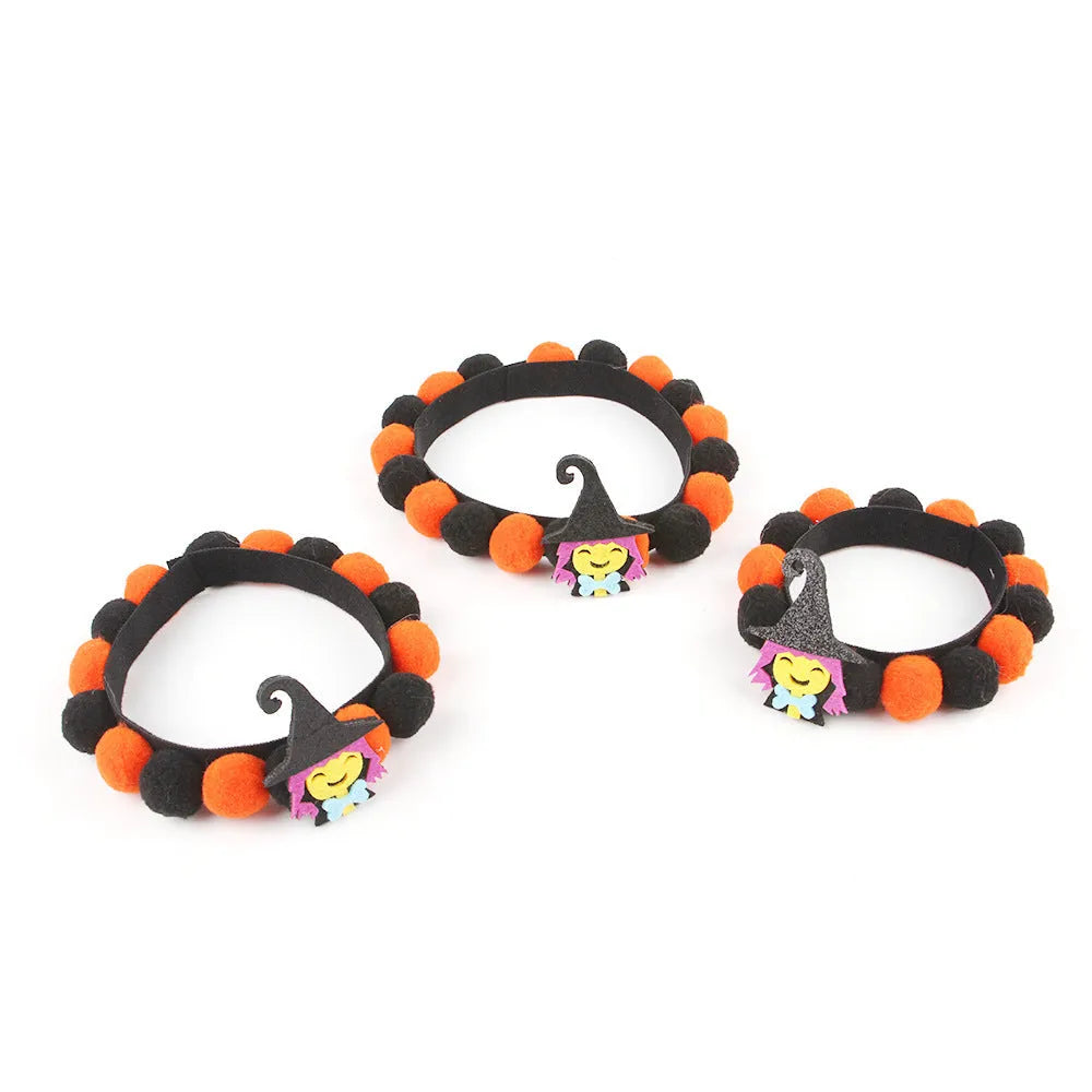 Halloween pet collar with fur ball decorations in pumpkin, bow, skull and witch designs