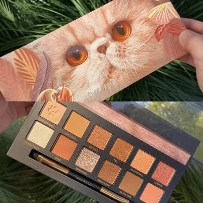 Explorer twelve-colour animal themed eye shadow palette open showing shades.