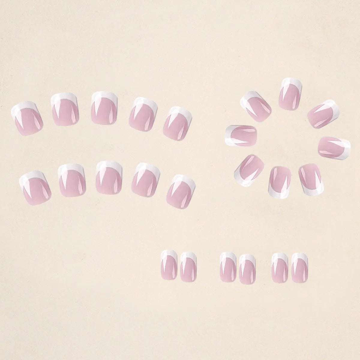 White fake nails with black and white plaid pattern, 24 pieces in an open box.