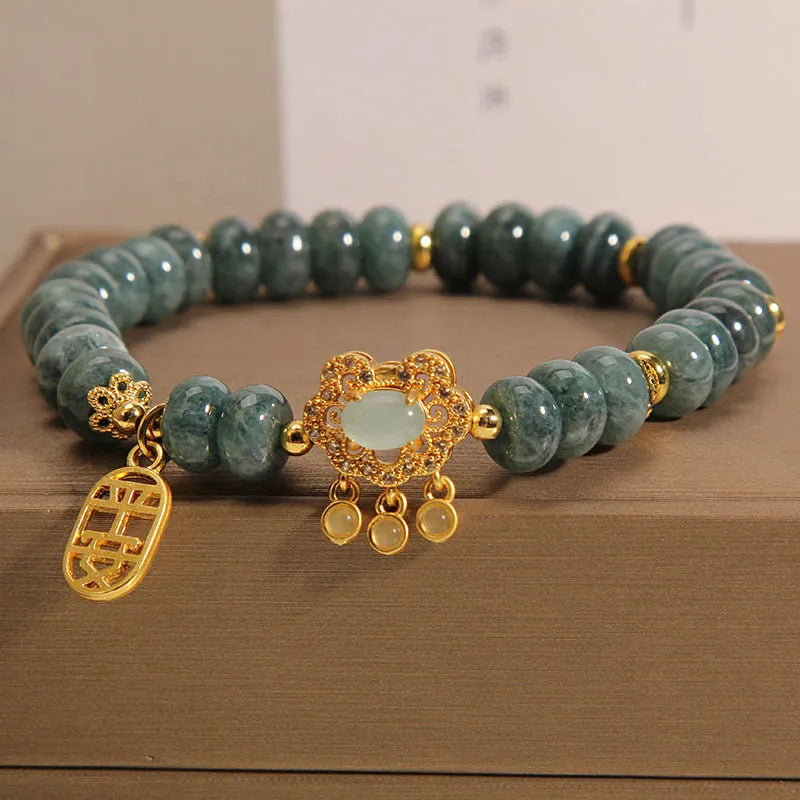 Women's bracelet with emerald jade abacus beads and alloy safety lock clasp