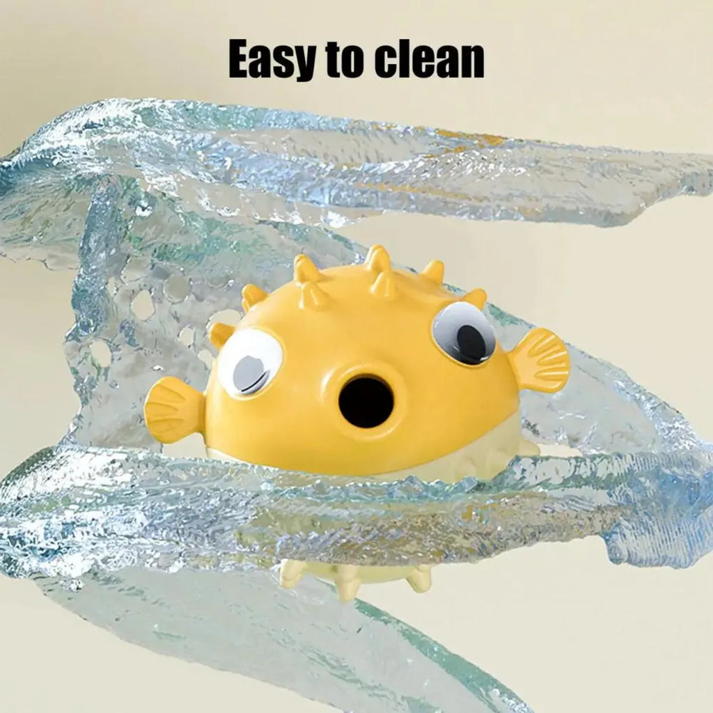 Yellow fish-shaped durable vinyl dog chew toy with textured surface and squeaker.