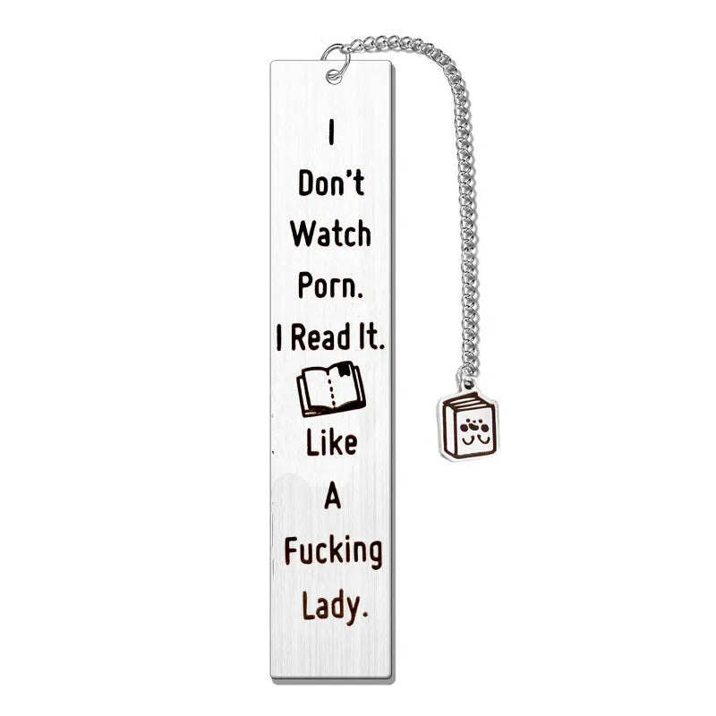 Stainless steel metal bookmark with a tassel, displayed next to its gift box.