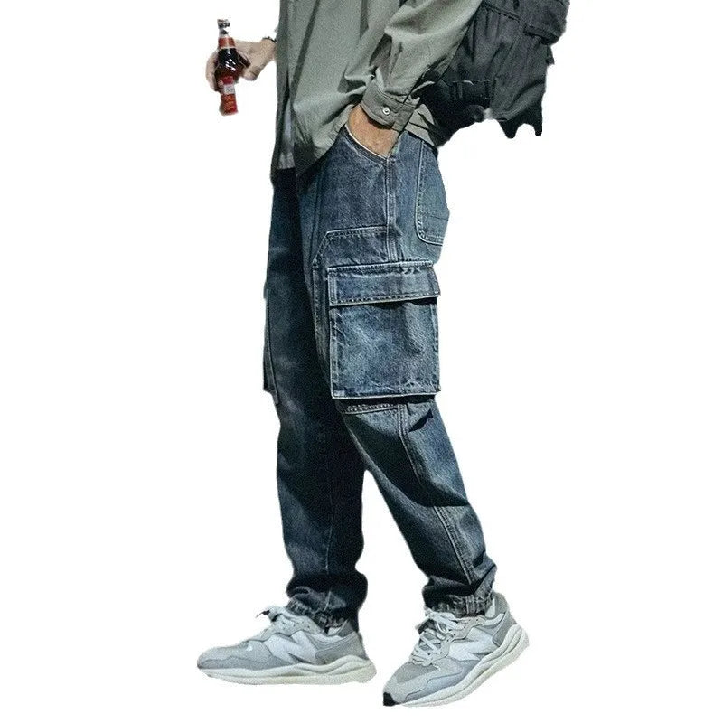 Men's blue loose straight leg jeans with zip fly made from stretch polyester denim fabric