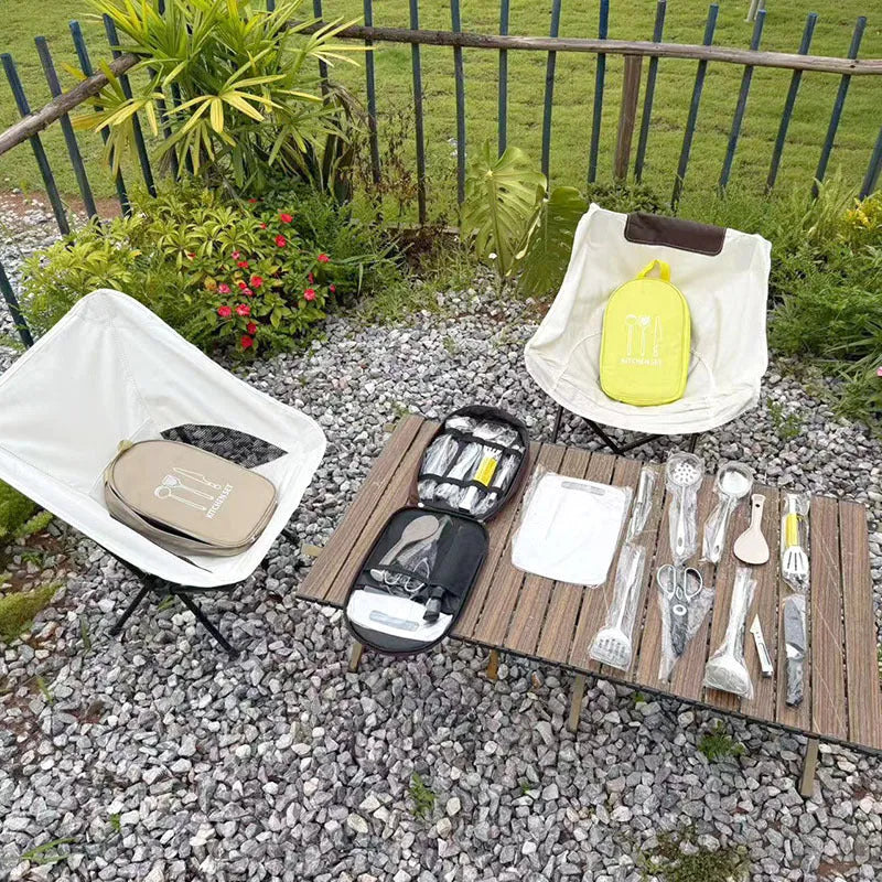 Portable khaki bag containing a 12-piece stainless steel picnic kitchenware set for outdoor dining.