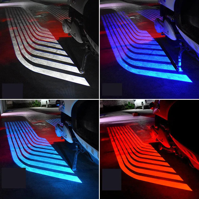 Wings projection LED lamp with aluminium housing and projection lens, for motorcycles and vehicles, available in blue, ice blue, red, or white.