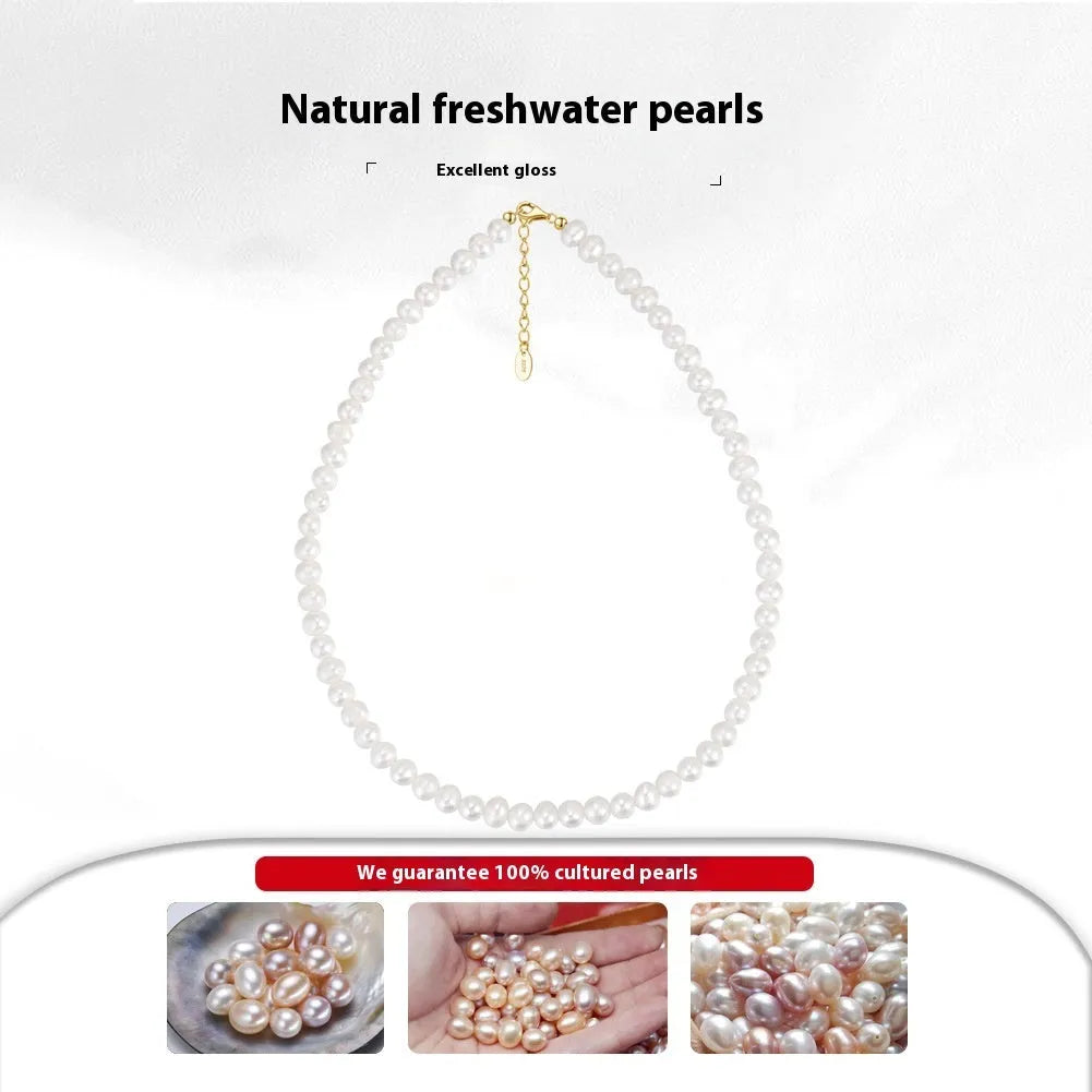 Women's adjustable silver necklace with natural freshwater pearls on a model