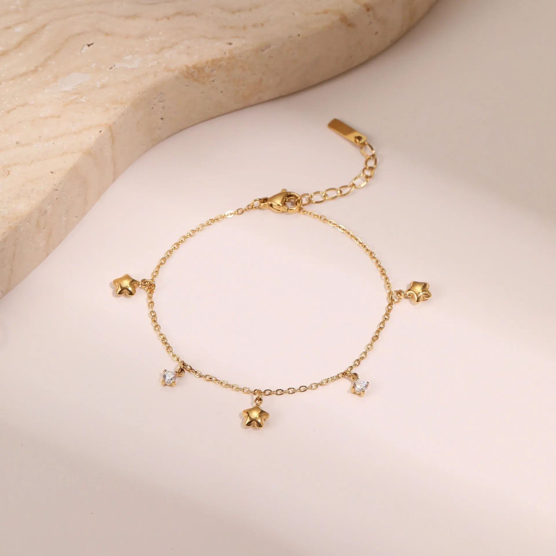 Women's titanium steel bracelet with 18K gold plating and geometric hexagonal star pendant