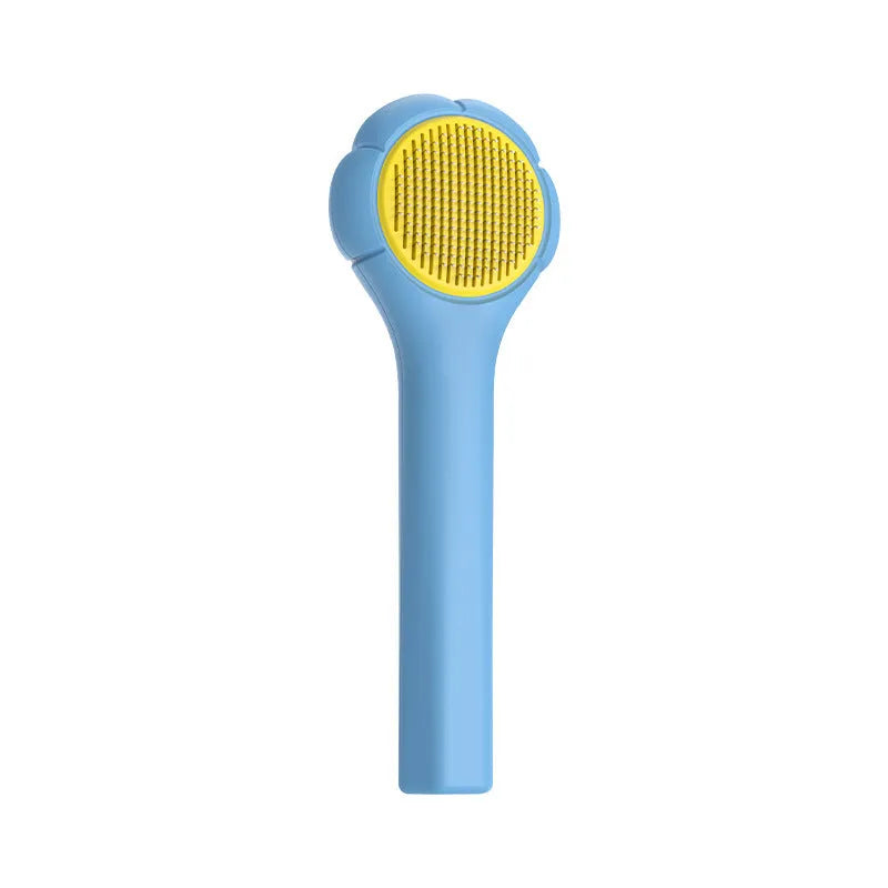 Floating needle comb for cats and dogs in green colour with ABS handle and steel teeth
