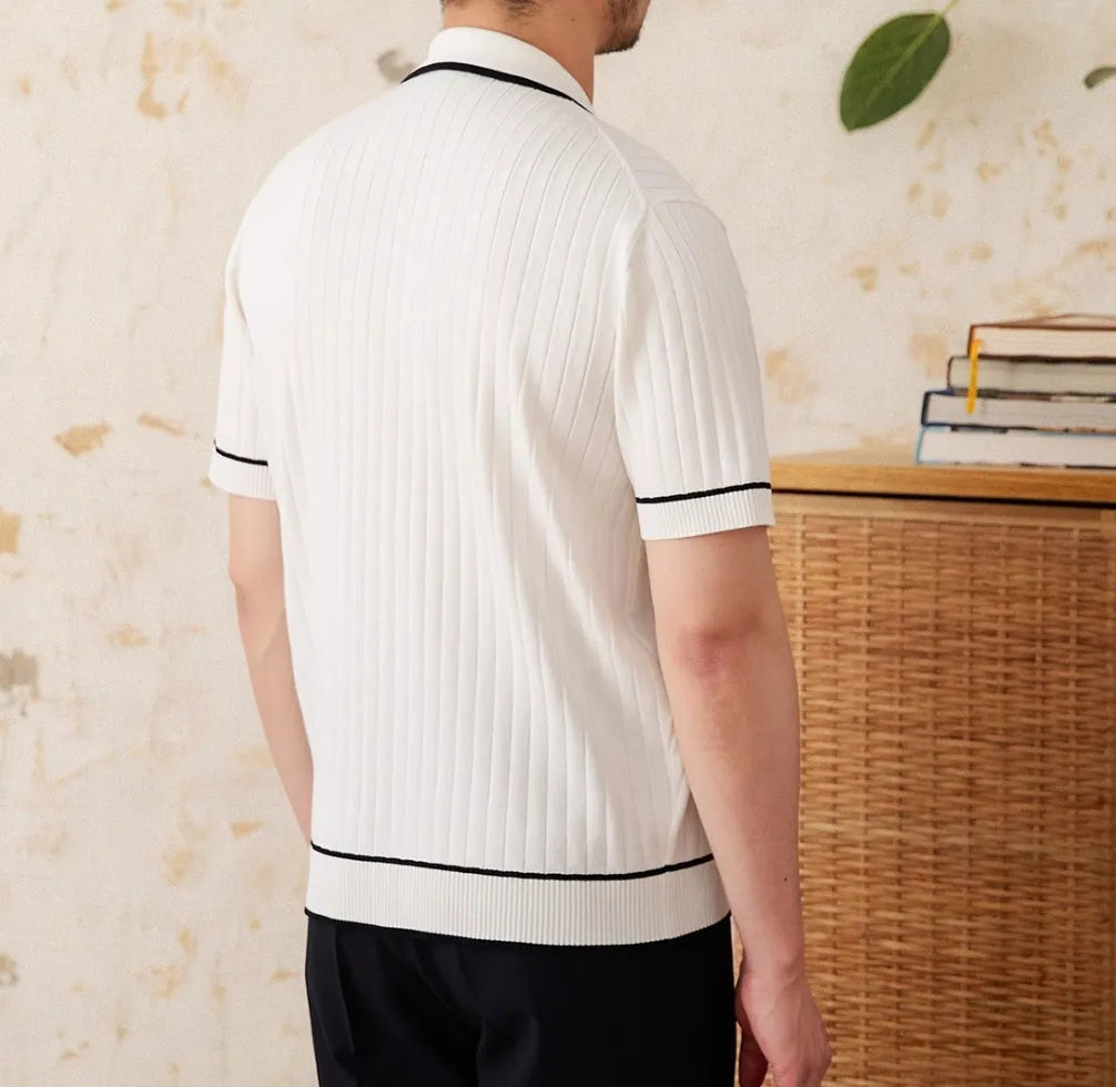 Slim black lapel collar short-sleeved polo shirt made from a thin viscose blend fabric.