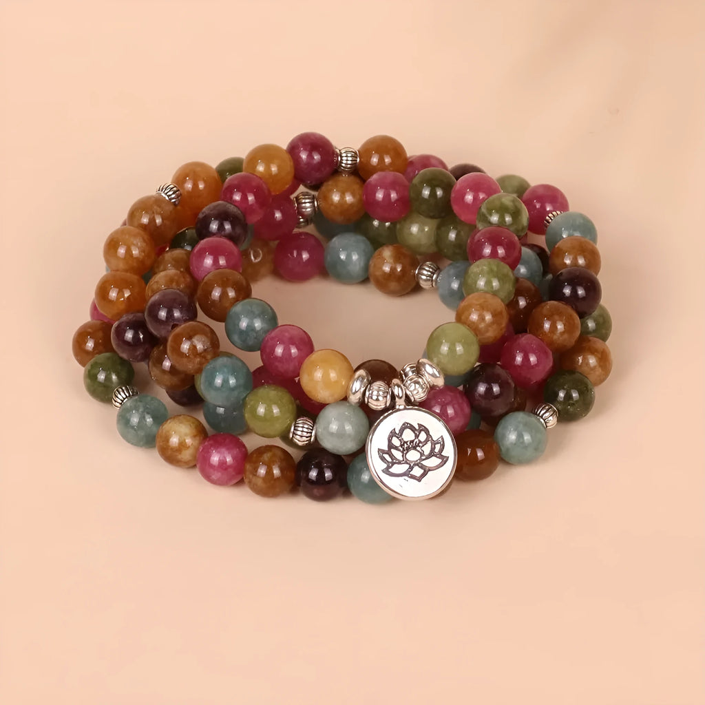 108-bead multi-layer bracelet with lotus hanging design in tourmaline-coloured alloy