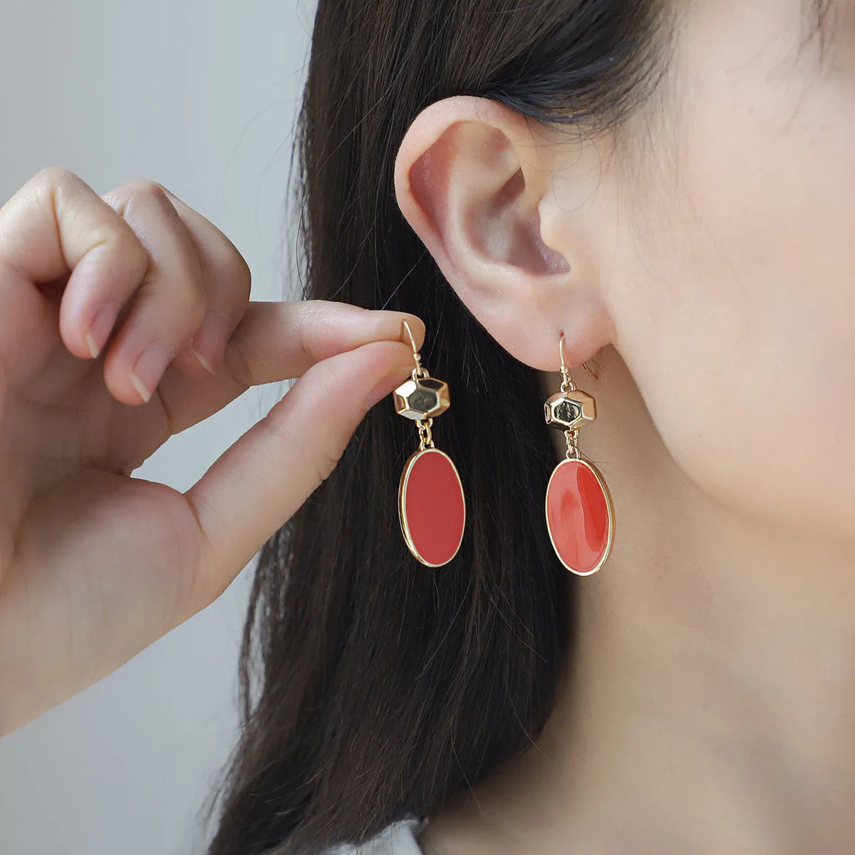 Colourful flower stud earrings made from alloy for women, supplied as one pair in three colour options.