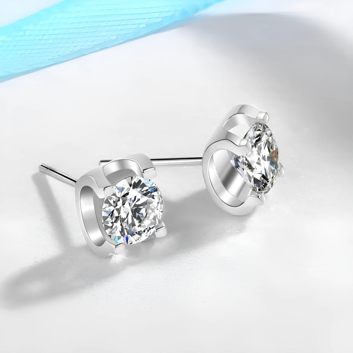 Bullhead artificial diamond stud earrings in white gold colour with 925 silver needle and geometric water flow design