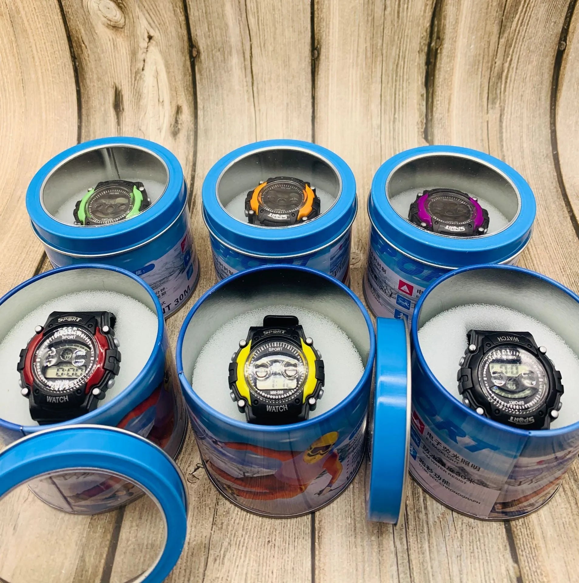Children's digital sports watch with large display and colourful silicone strap.