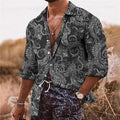 Man wearing a loose fit men's shirt with a detailed 3D floral pattern print on polyester fabric.