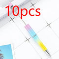 Colourful spinning plastic beaded ballpoint pen showing rotating barrel design.